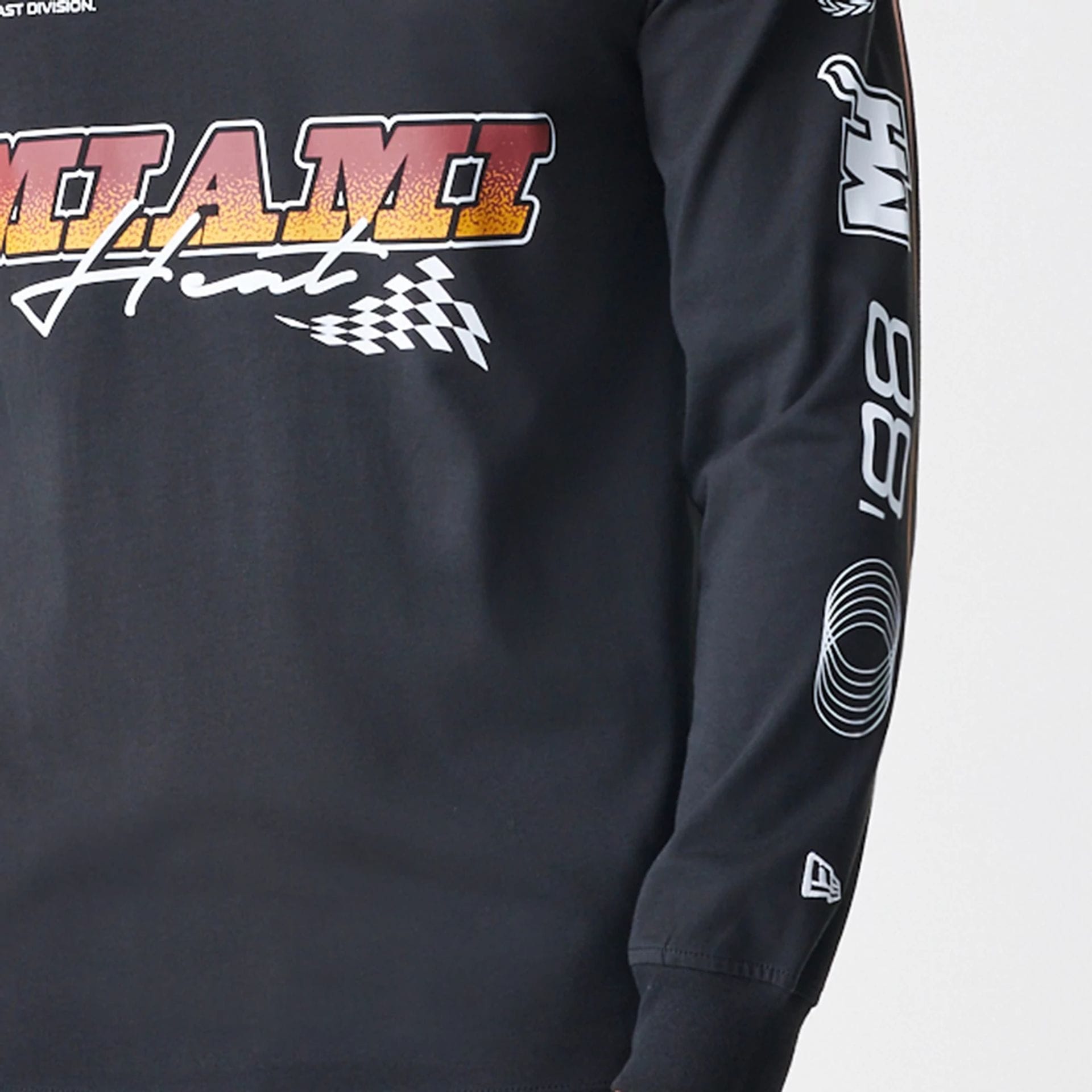 The Male model is wearing Miami Heat Modern Driver Black Long Sleeve T-Shirt 4