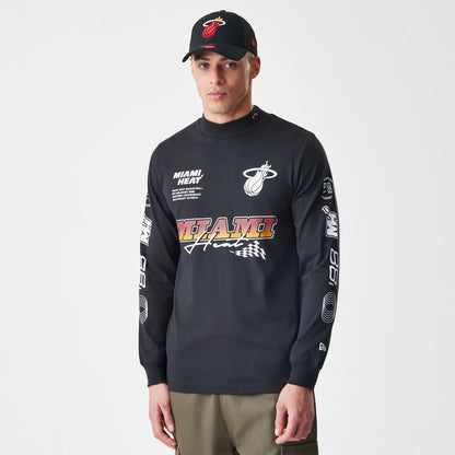 The Male model is wearing Miami Heat Modern Driver Black Long Sleeve T-Shirt 1
