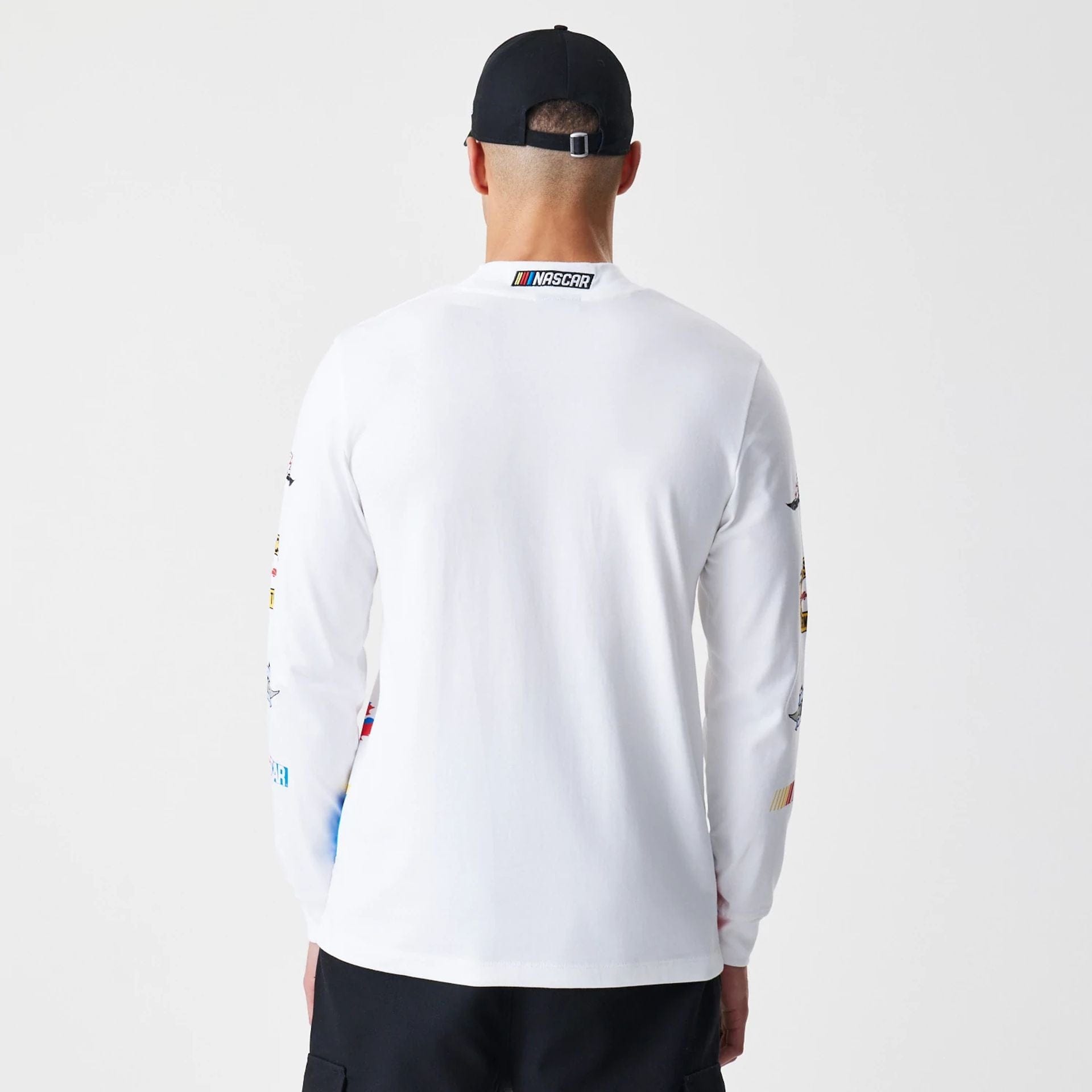 The Male model is wearing Nascar Generic Logo Modern Driver White Long Sleeve T-Shirt 2