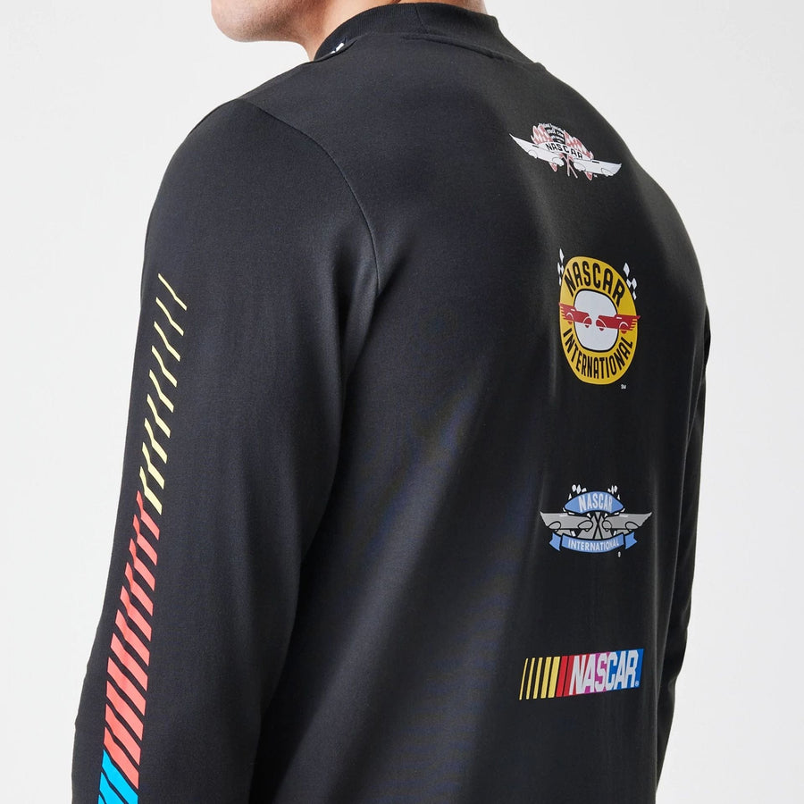 The Male model is wearing Nascar Generic Logo Modern Driver Black Long Sleeve T-Shirt 4