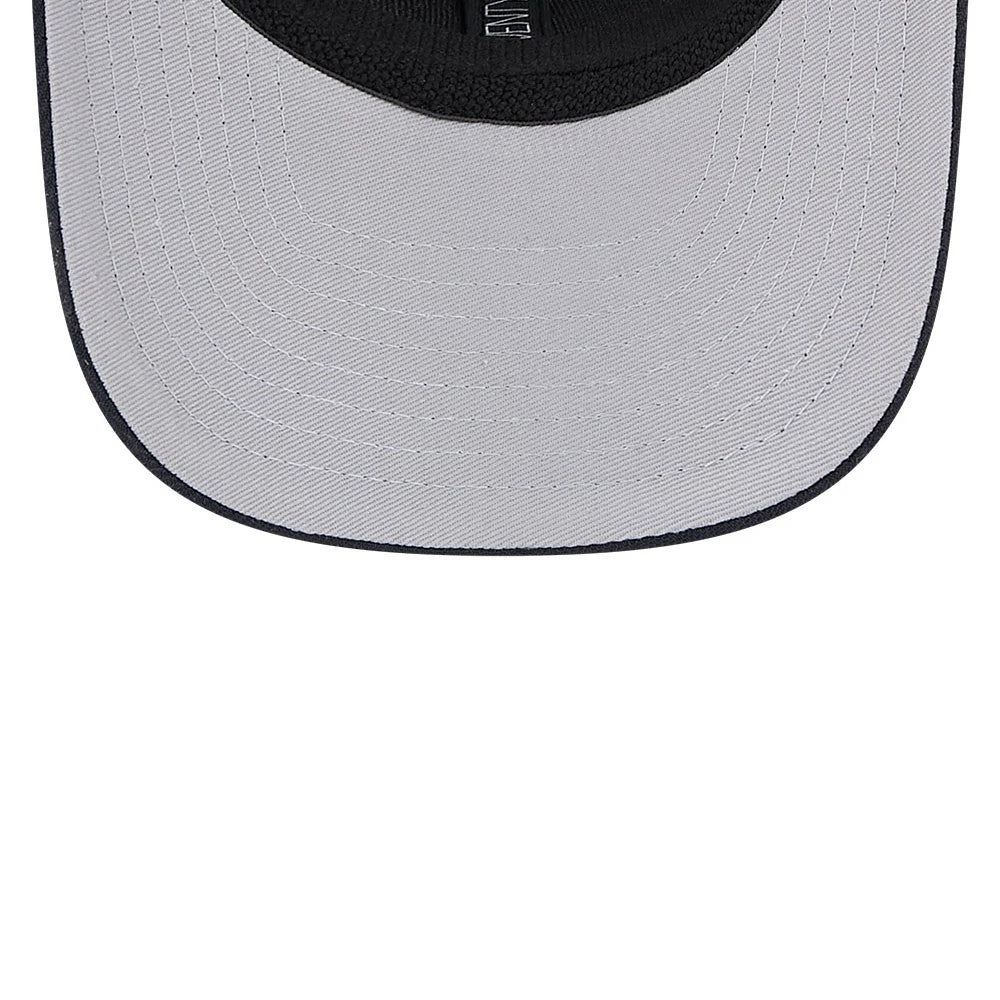 Houston Astros MLB Evergreen Navy New Era 9SEVENTY Stretch Snap Adjustable Cap, inside view showing the black sweatband with an embroidered New Era logo and grey undervisor with detailed stitching.