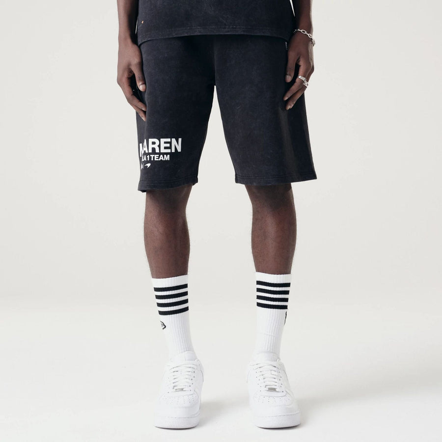 The Male model is wearing McLaren Racing Washed Pack Black Oversized Shorts 1