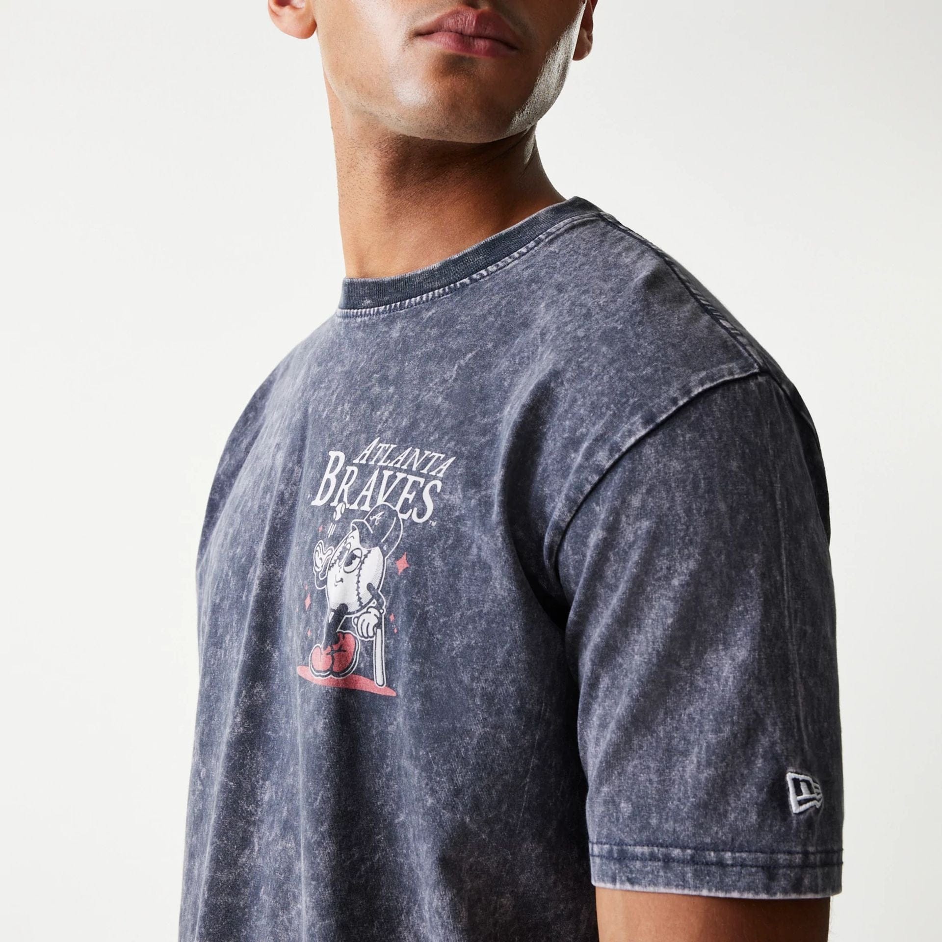 The Male model is wearing Atlanta Braves MLB Character Navy T-Shirt 6