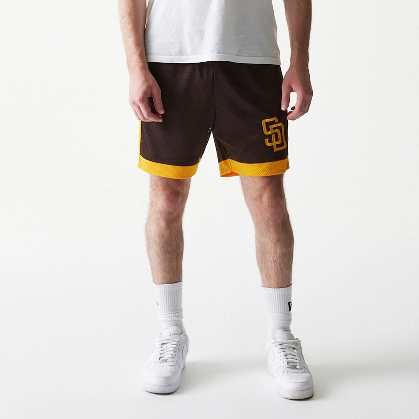 The Male model is wearing San Diego Padres Sport Classic Dark Brown Shorts 3