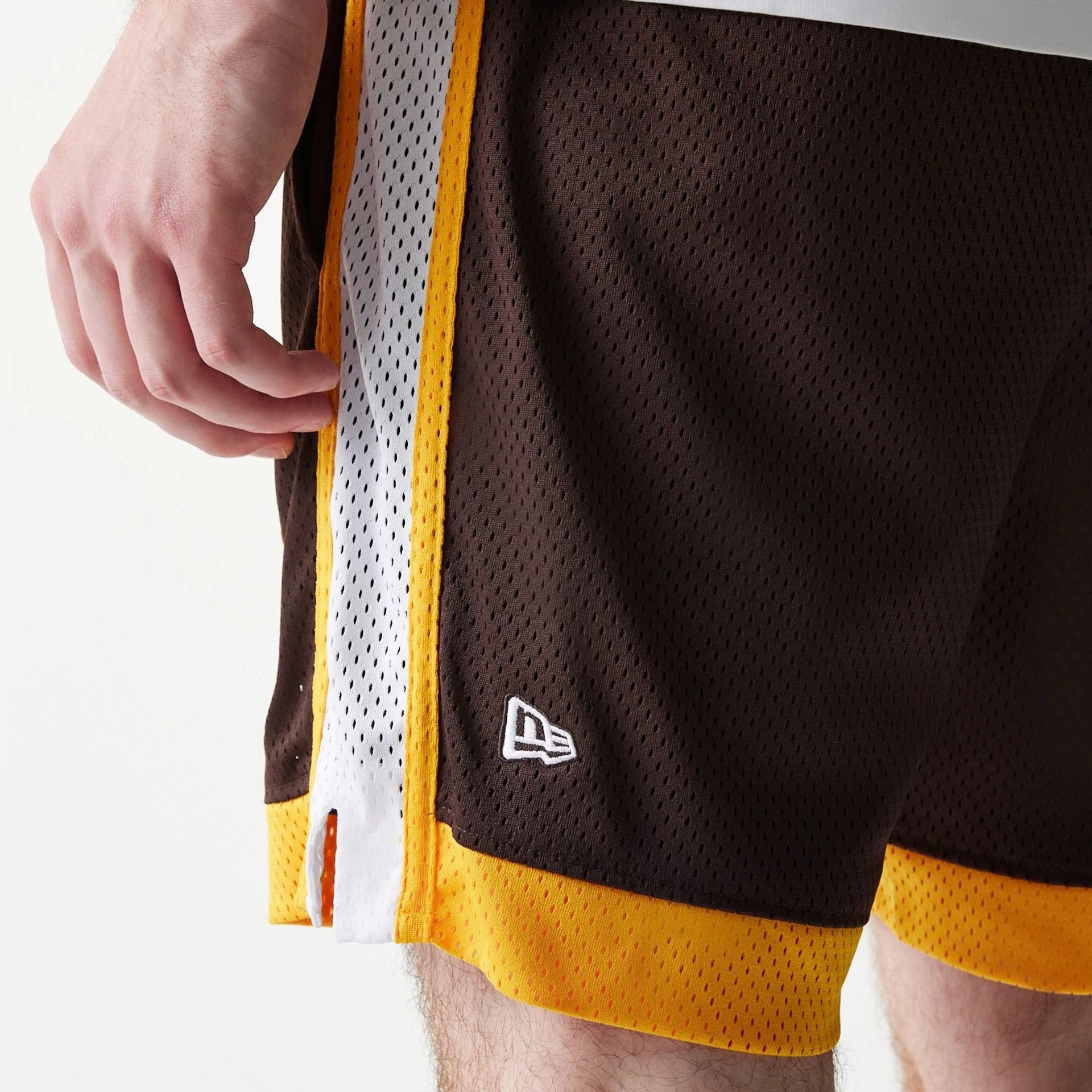 The Male model is wearing San Diego Padres Sport Classic Dark Brown Shorts 5
