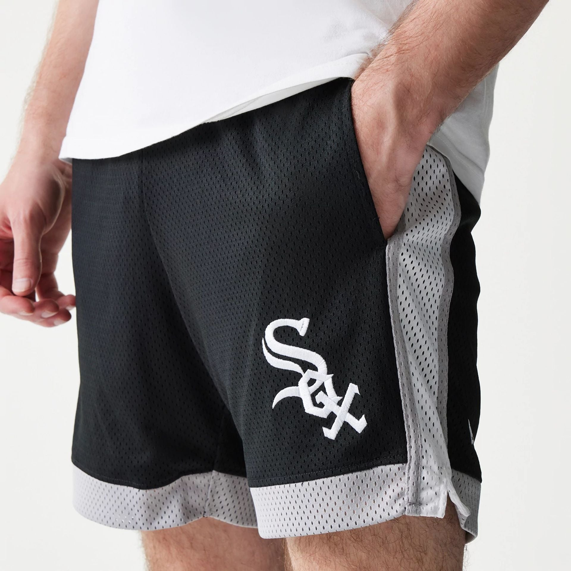 The Male model is wearing Chicago White Sox Sport Classic Black Shorts 3