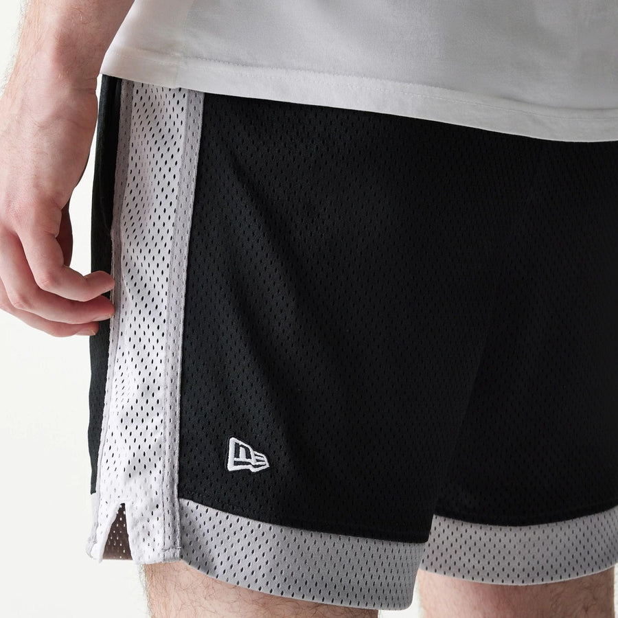 The Male model is wearing Chicago White Sox Sport Classic Black Shorts 4