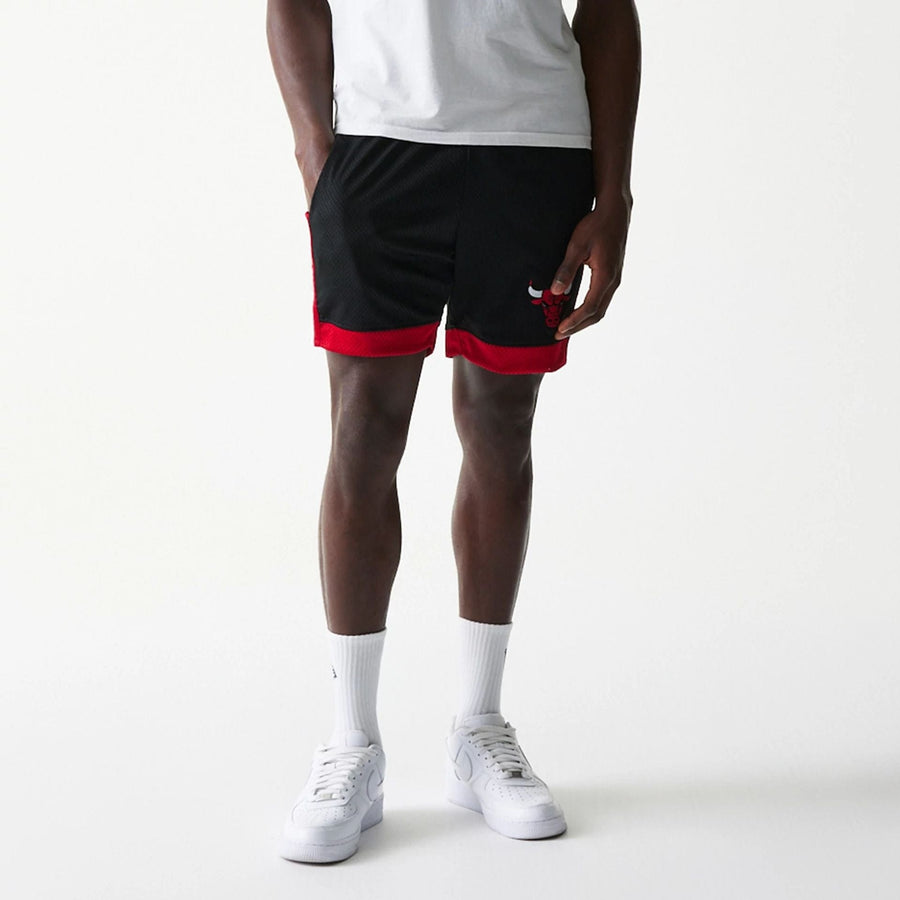 The Male model is wearing Chicago Bulls Sport Classic Black Shorts 7