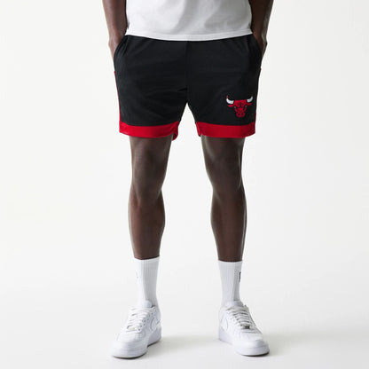 The Male model is wearing Chicago Bulls Sport Classic Black Shorts 1