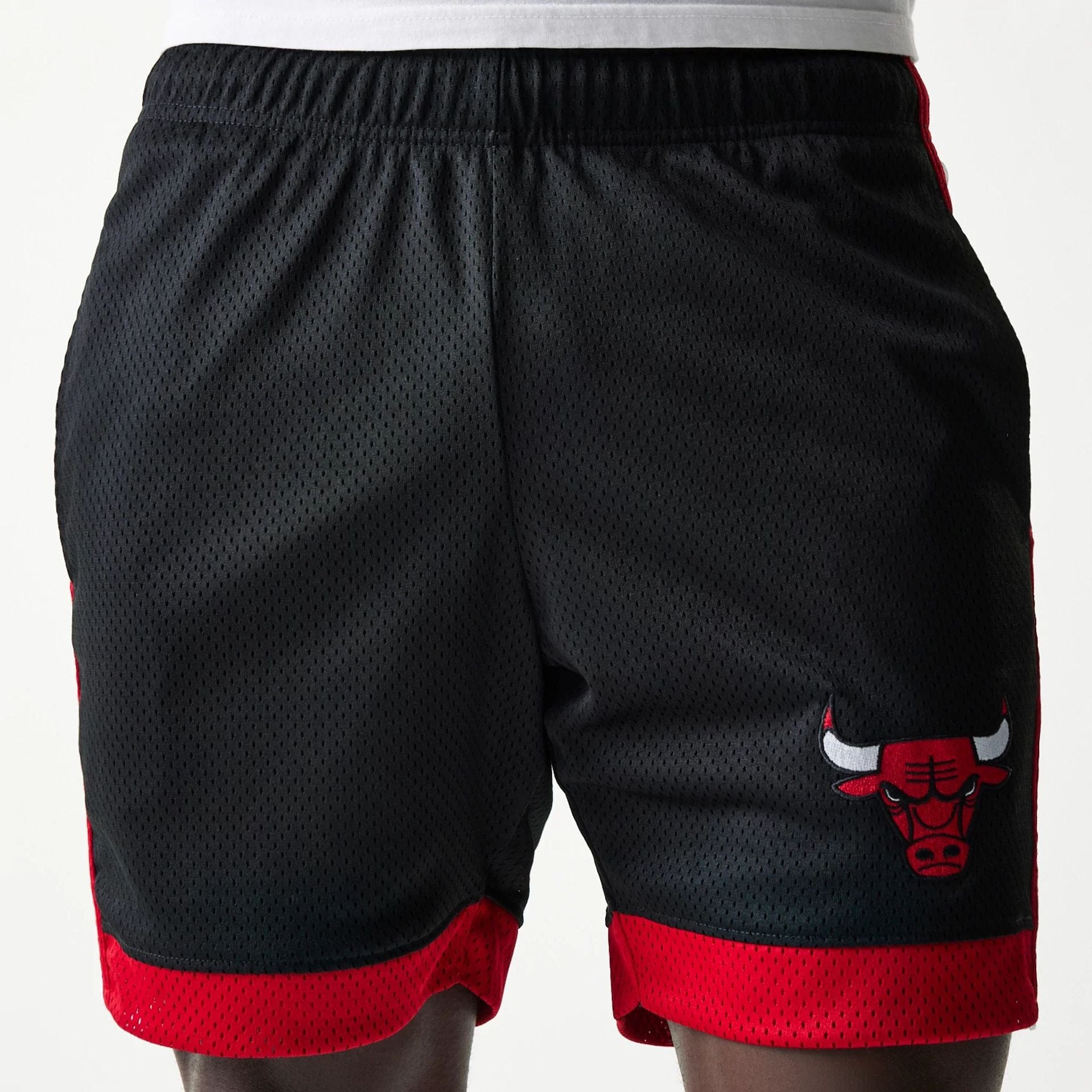 The Male model is wearing Chicago Bulls Sport Classic Black Shorts 5