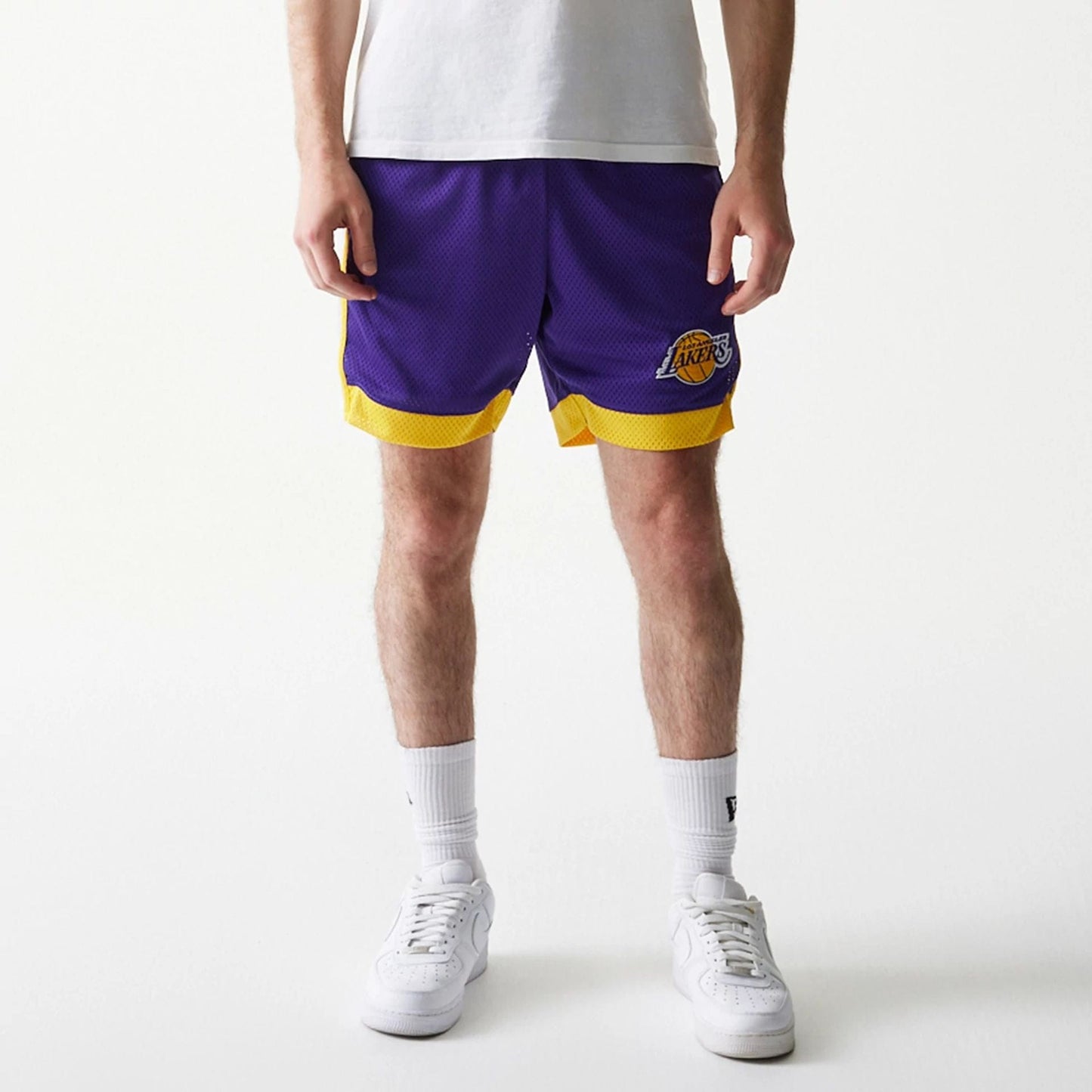 The Male model is wearing LA Lakers Sport Classic Purple Shorts 7
