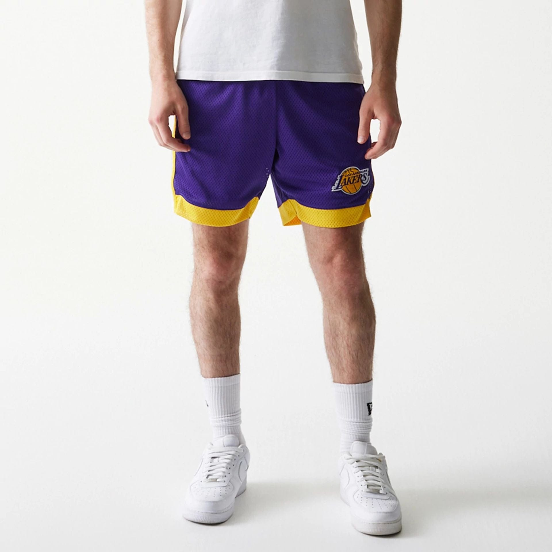 The Male model is wearing LA Lakers Sport Classic Purple Shorts 7