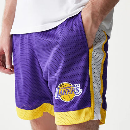 The Male model is wearing LA Lakers Sport Classic Purple Shorts 3