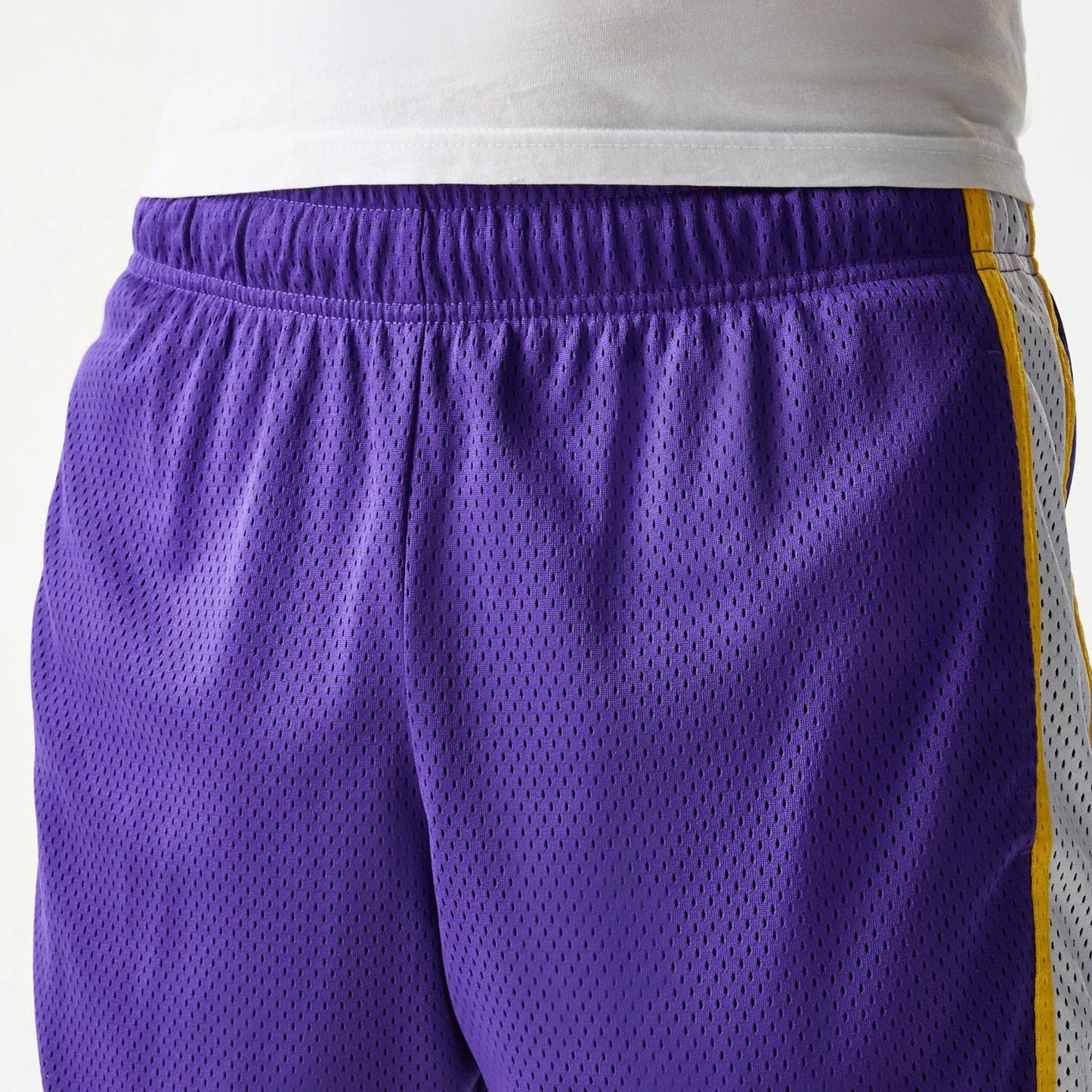 The Male model is wearing LA Lakers Sport Classic Purple Shorts 5