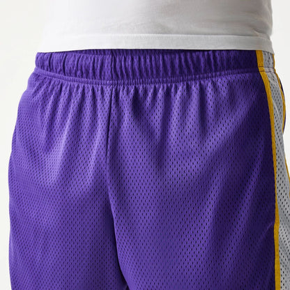 The Male model is wearing LA Lakers Sport Classic Purple Shorts 5