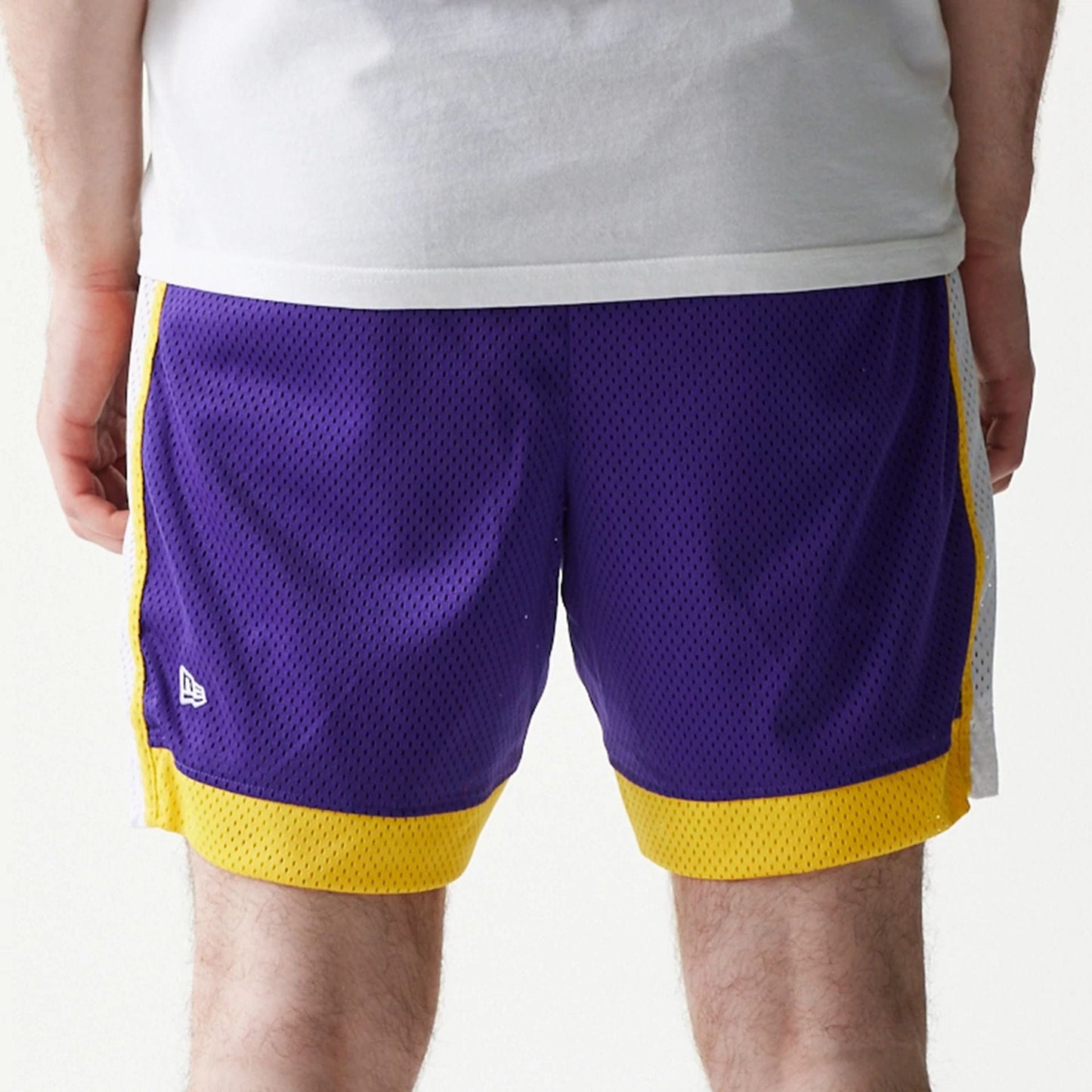 The Male model is wearing LA Lakers Sport Classic Purple Shorts 6
