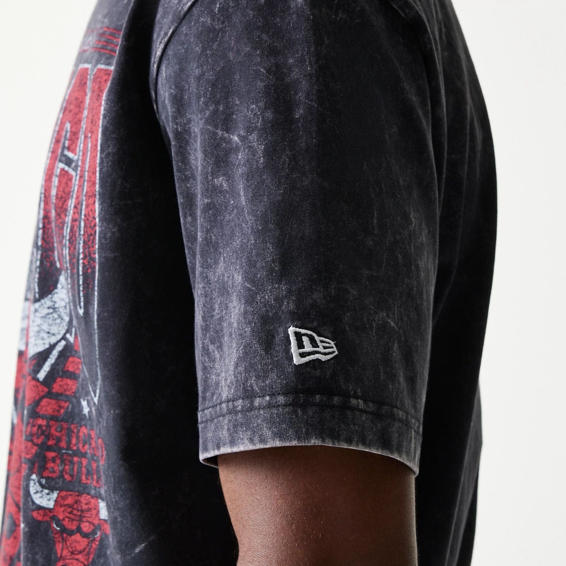 The Male model is wearing Chicago Bulls Sport Classic Black T-Shirt 5