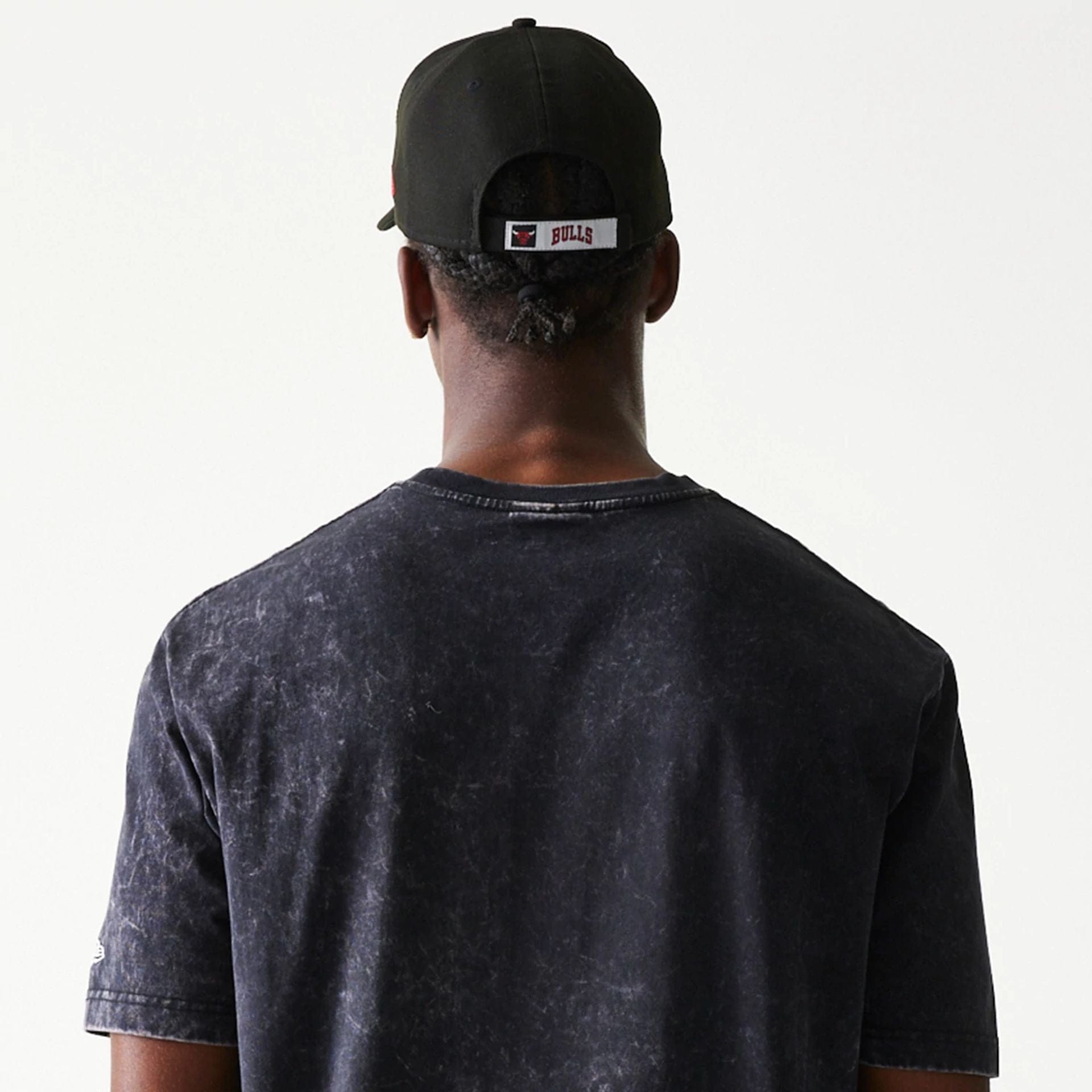 The Male model is wearing Chicago Bulls Sport Classic Black T-Shirt 6