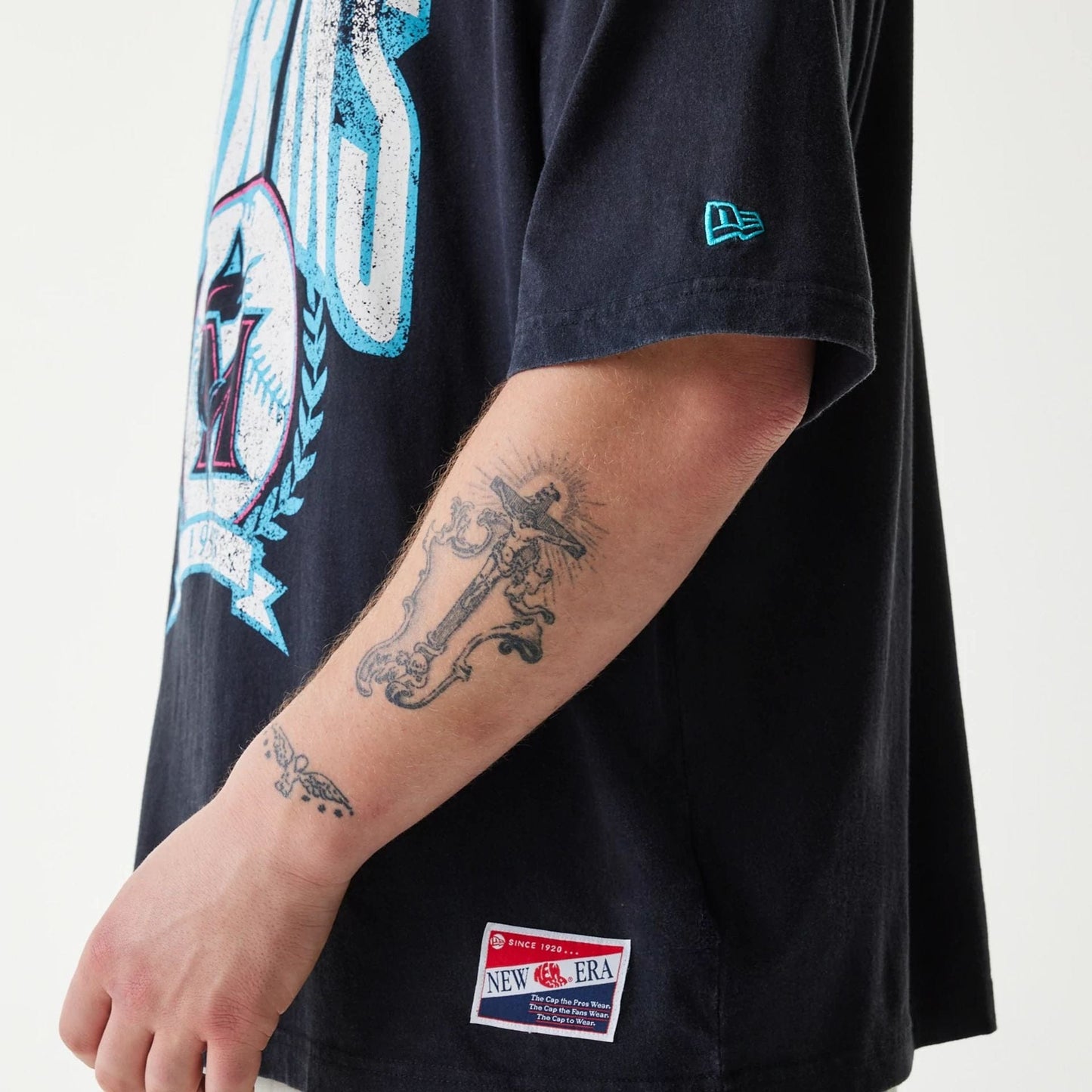 The Male model is wearing Miami Marlins MLB City Connect G1 Black T-Shirt 4