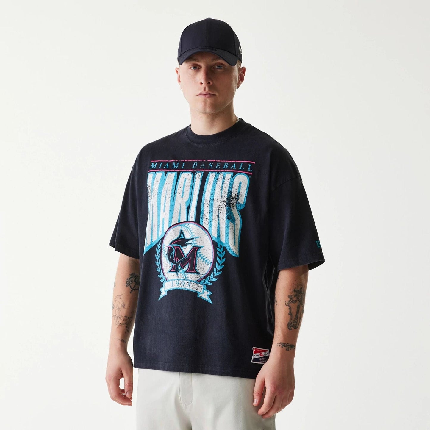 The Male model is wearing Miami Marlins MLB City Connect G1 Black T-Shirt 1