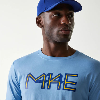 The Male model is wearing Milwaukee Brewers MLB City Connect Blue T-Shirt 4