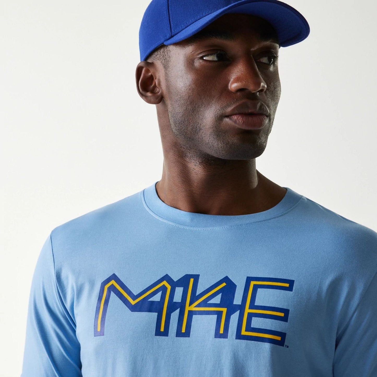 The Male model is wearing Milwaukee Brewers MLB City Connect Blue T-Shirt 4