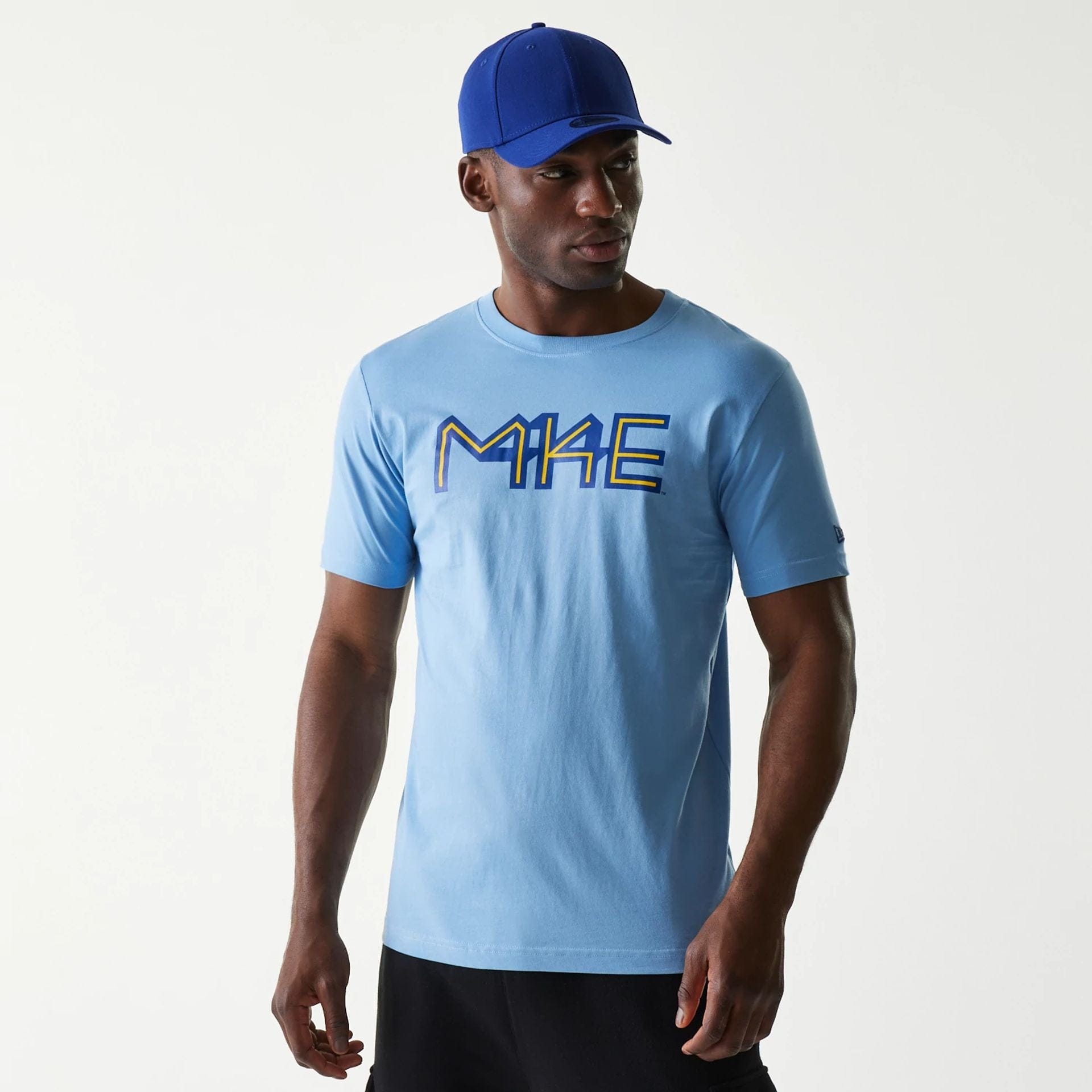 The Male model is wearing Milwaukee Brewers MLB City Connect Blue T-Shirt 1
