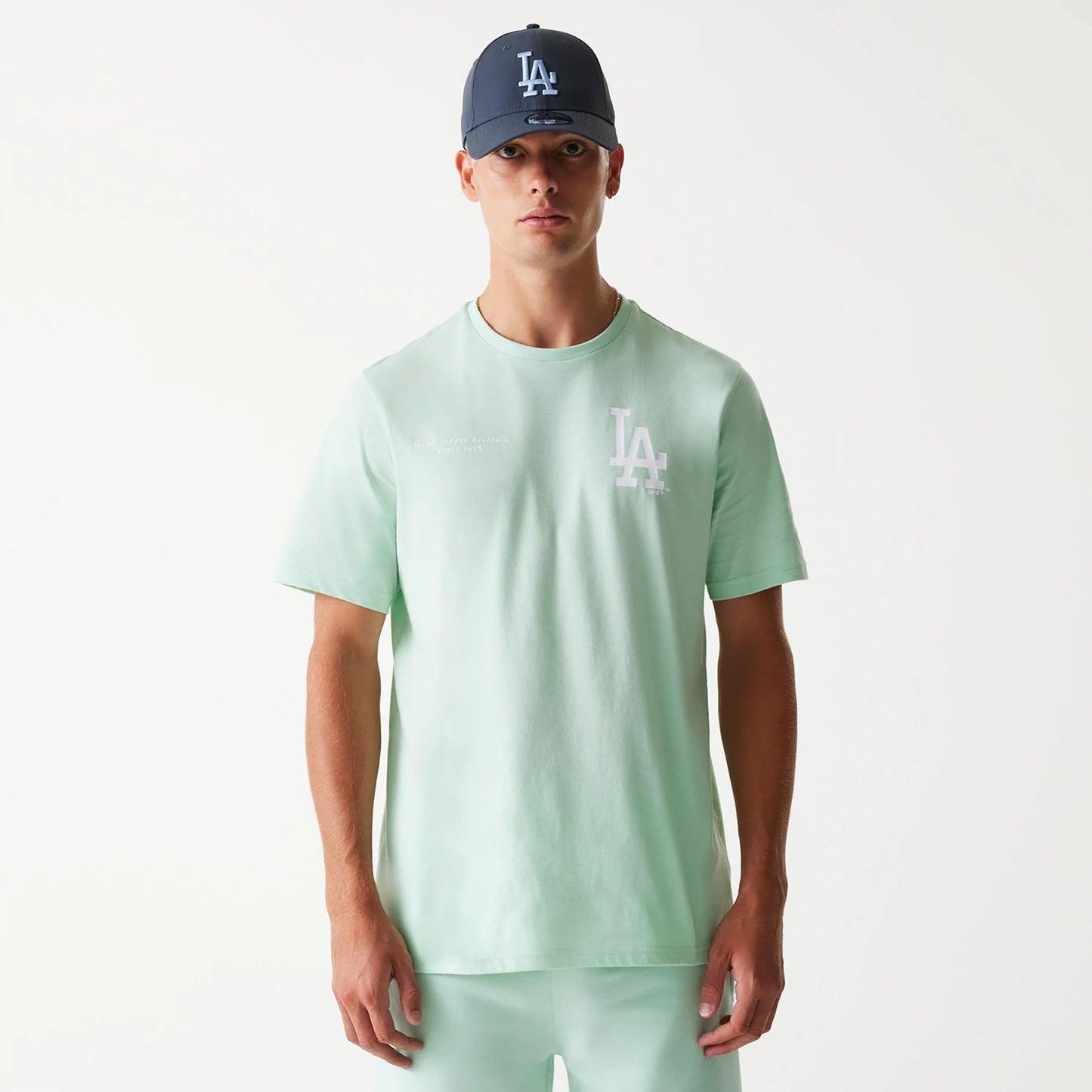 The Male model is wearing LA Dodgers MLB Arch Graphic Pastel Green T-Shirt 1