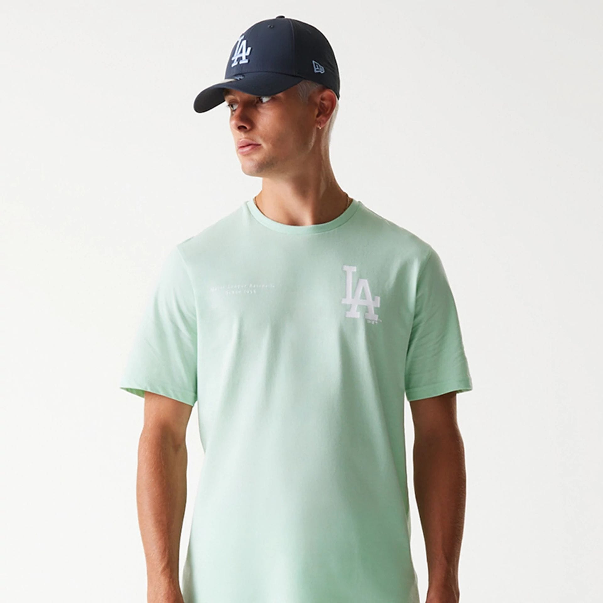 The Male model is wearing LA Dodgers MLB Arch Graphic Pastel Green T-Shirt 3