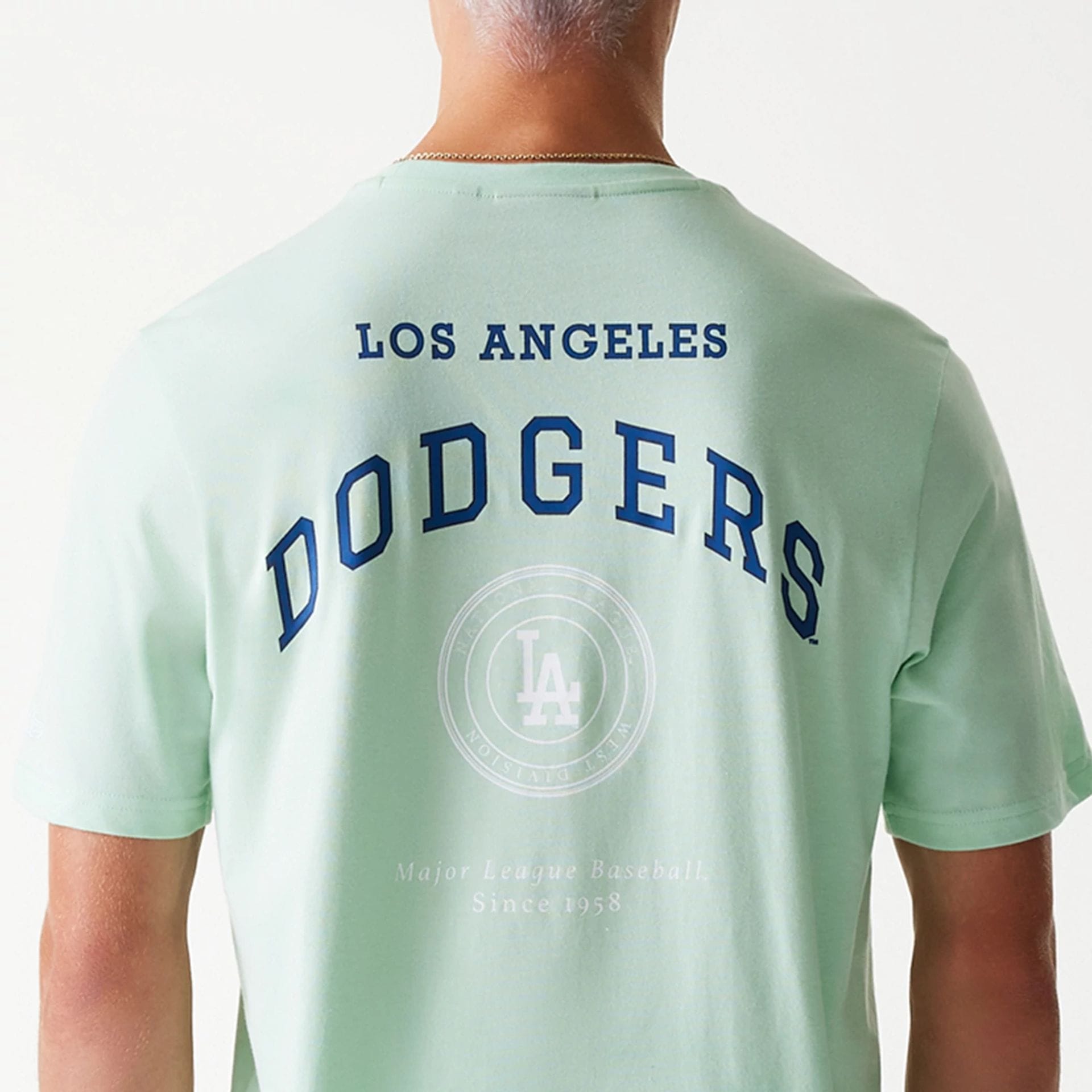 The Male model is wearing LA Dodgers MLB Arch Graphic Pastel Green T-Shirt 4