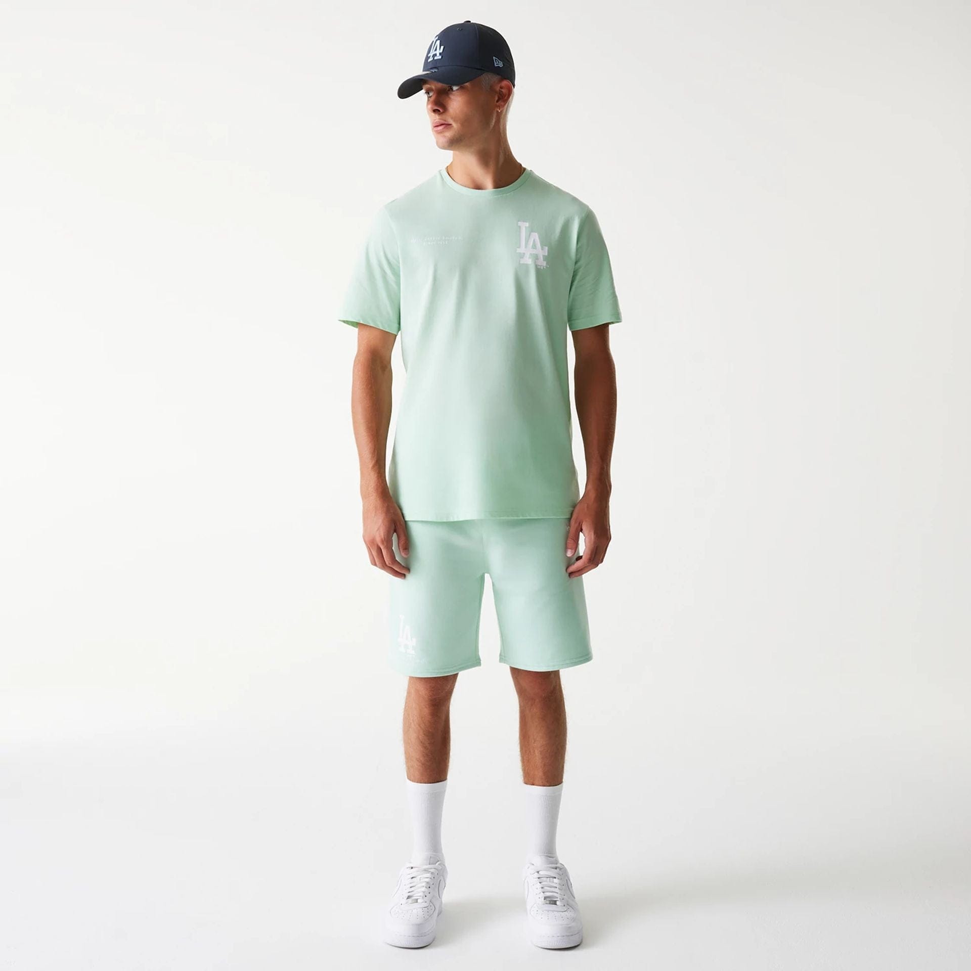 The Male model is wearing LA Dodgers MLB Arch Graphic Pastel Green T-Shirt 8