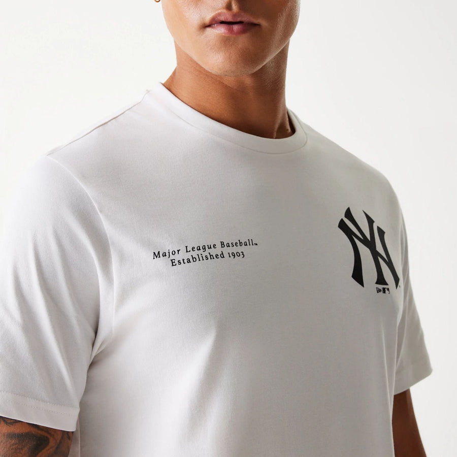 The Male model is wearing New York Yankees MLB Arch Graphic Open White T-Shirt 5