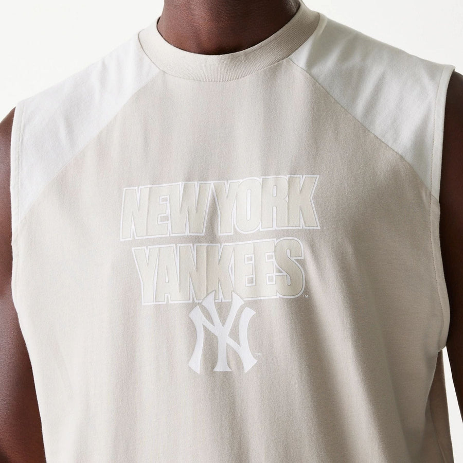 The Male model is wearing New York Yankees MLB Cream Sleeveless T-Shirt 4