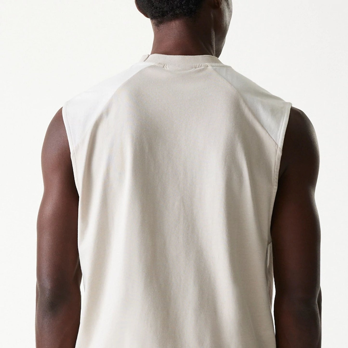 The Male model is wearing New York Yankees MLB Cream Sleeveless T-Shirt 7