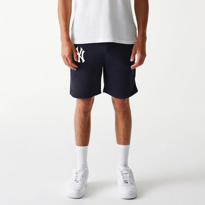 The Male model is wearing New York Yankees MLB League Essential Navy Shorts 8