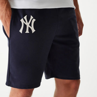 The Male model is wearing New York Yankees MLB League Essential Navy Shorts 3