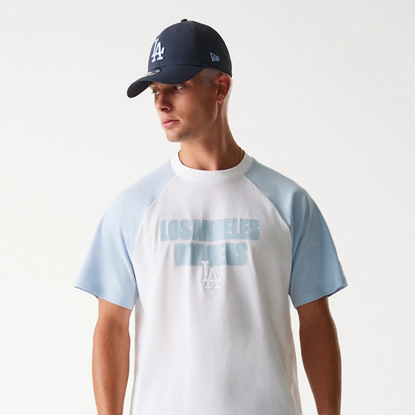 The Male model is wearing LA Dodgers MLB Raglan White Oversized T-Shirt 3