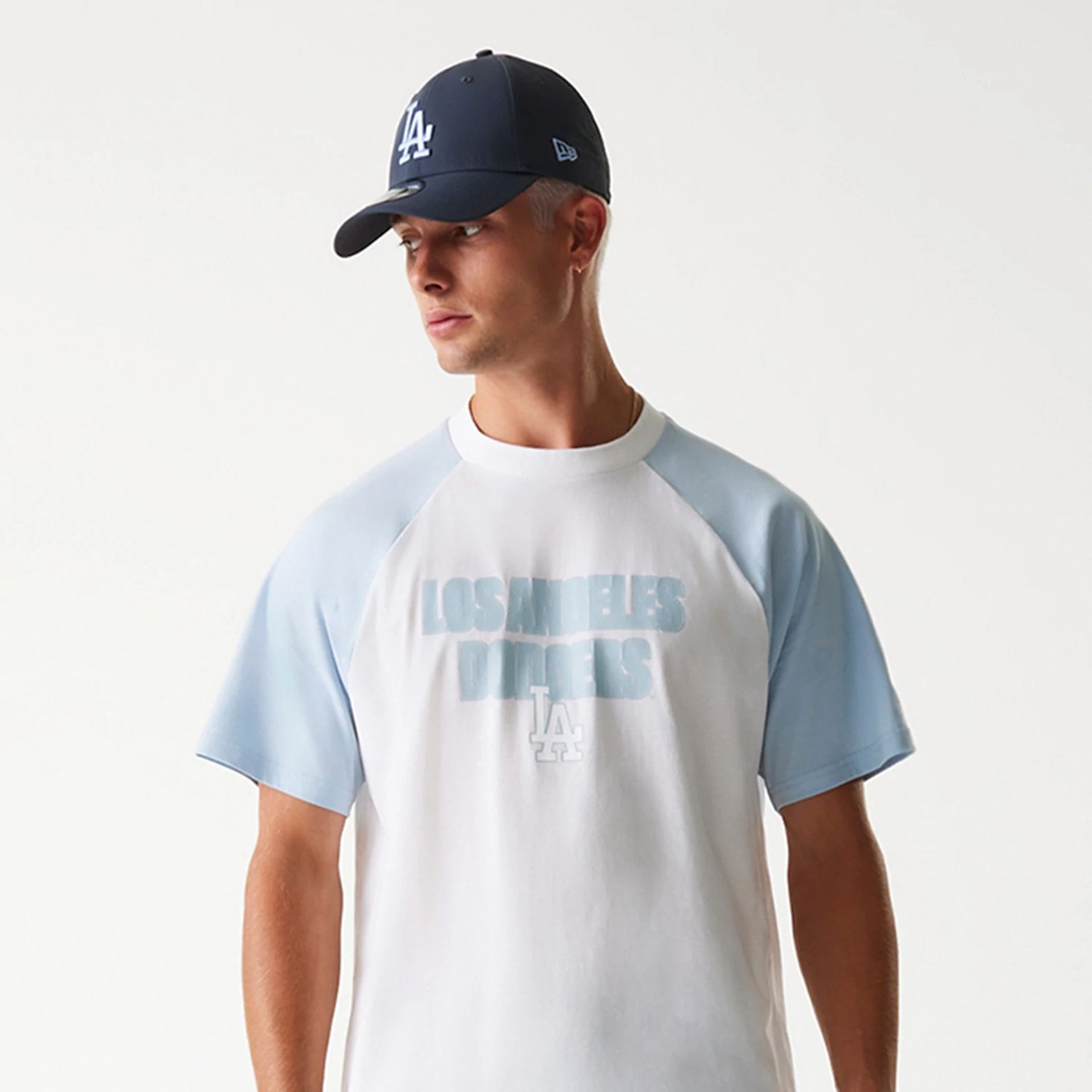 The Male model is wearing LA Dodgers MLB Raglan White Oversized T-Shirt 3