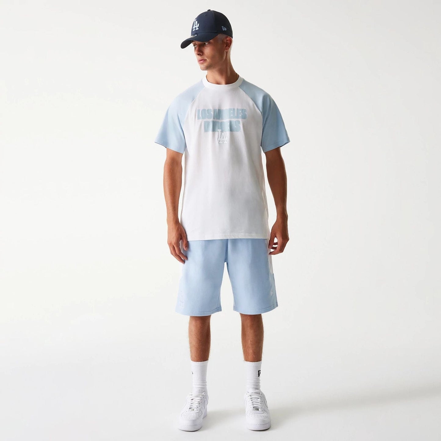 The Male model is wearing LA Dodgers MLB Raglan White Oversized T-Shirt 8