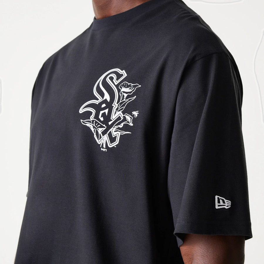 The Male model is wearing Chicago White Sox MLB Floral Graphic Black Oversized T-Shirt 3