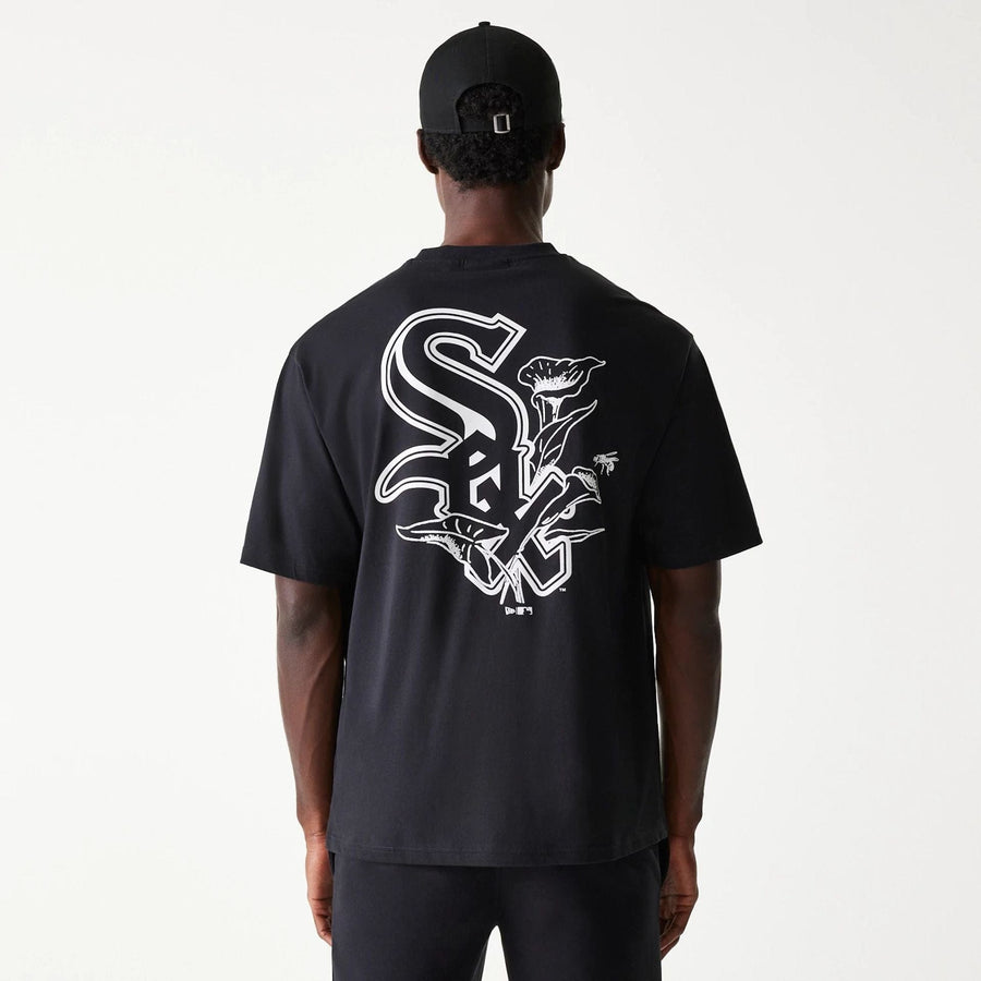 The Male model is wearing Chicago White Sox MLB Floral Graphic Black Oversized T-Shirt 2