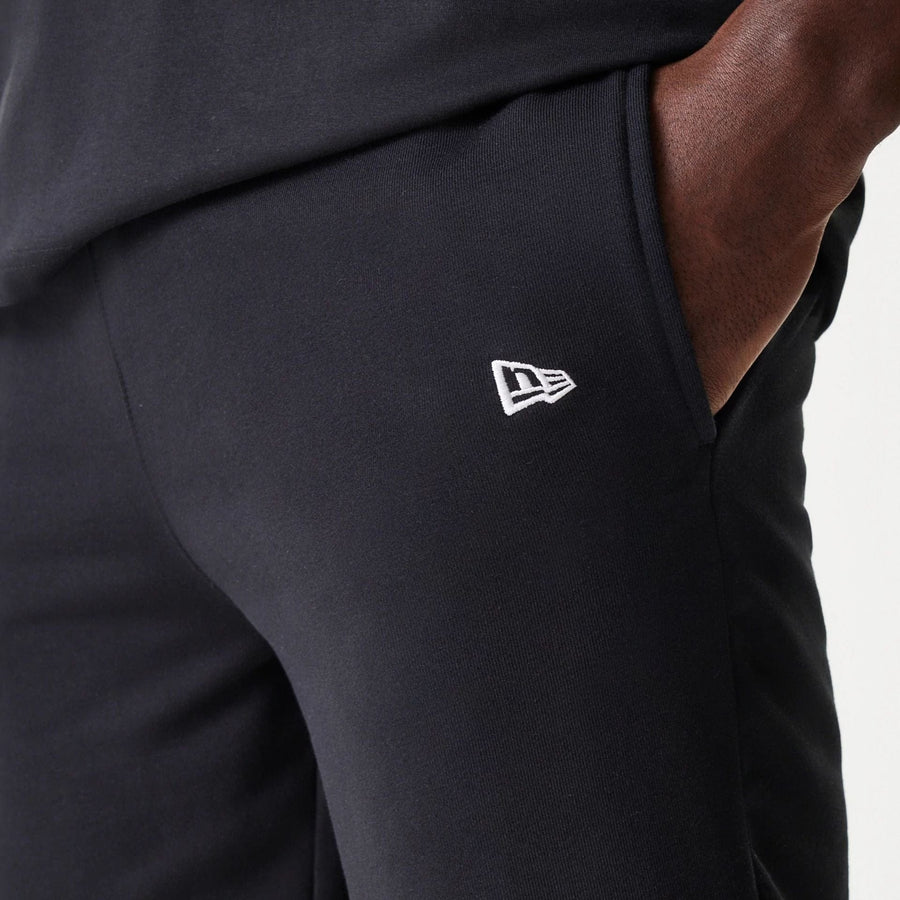 The Male model is wearing Chicago White Sox MLB League Essential Black Shorts 6