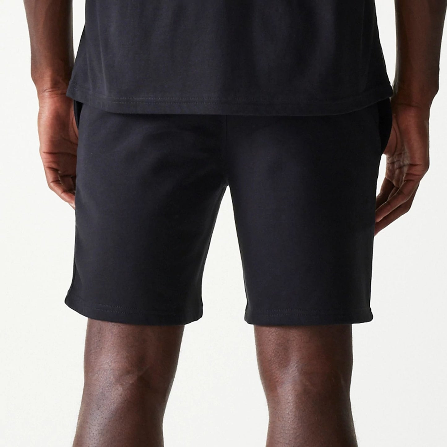 The Male model is wearing Chicago White Sox MLB League Essential Black Shorts 4