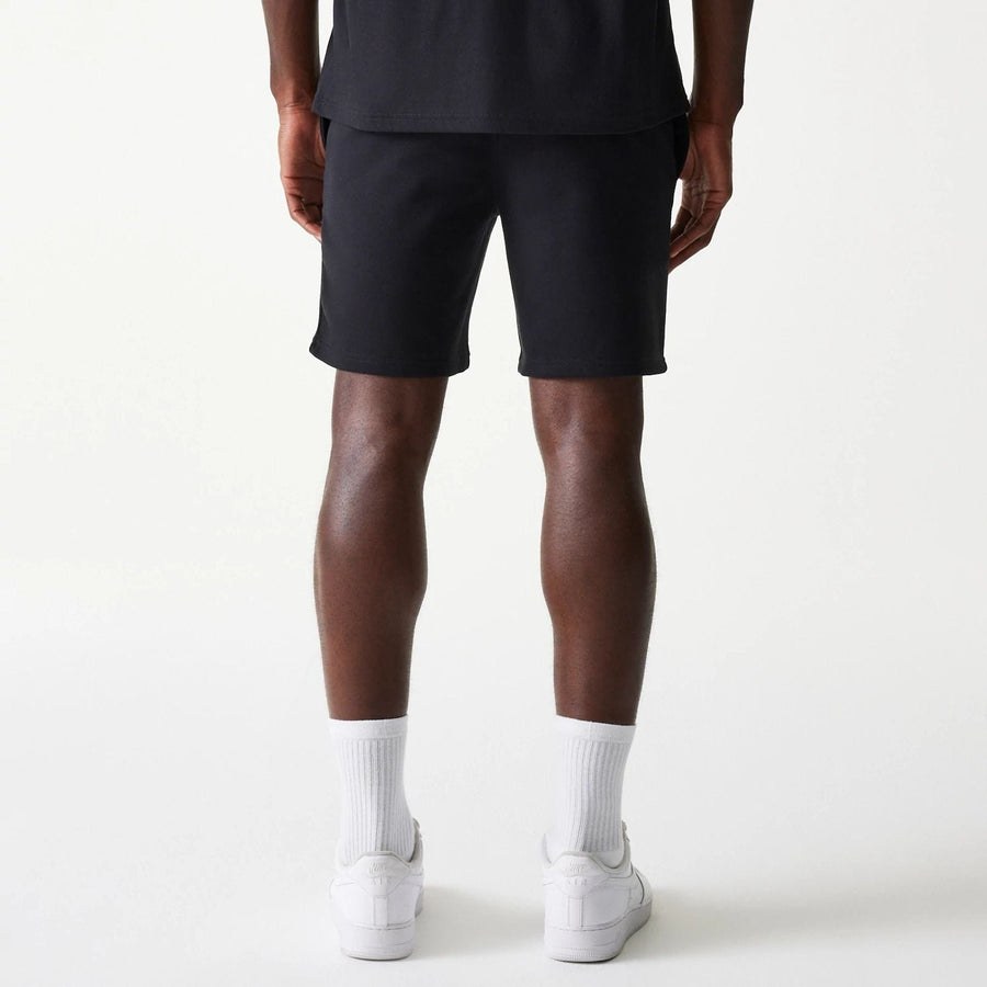 The Male model is wearing Chicago White Sox MLB League Essential Black Shorts 2