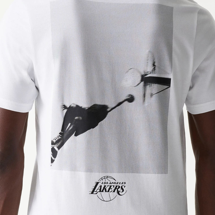 The Male model is wearing LA Lakers NBA Court Graphic White T-Shirt 4
