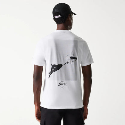 The Male model is wearing LA Lakers NBA Court Graphic White T-Shirt 2