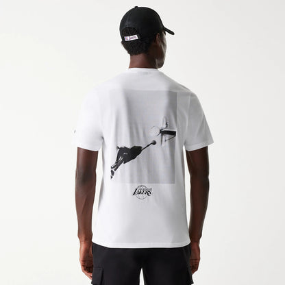 The Male model is wearing LA Lakers NBA Court Graphic White T-Shirt 2