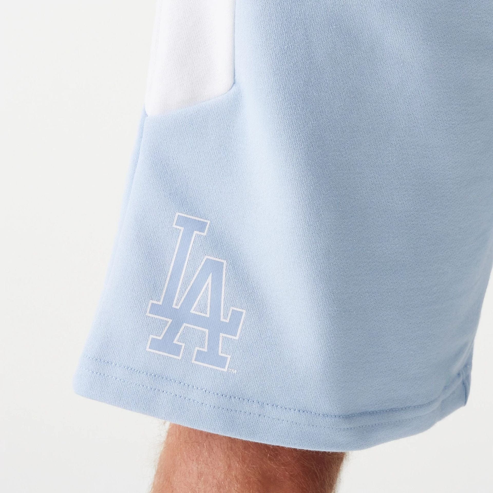 The Male model is wearing LA Dodgers MLB Raglan Pastel Blue Shorts 3