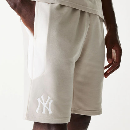 The Male model is wearing New York Yankees MLB Raglan Cream Shorts 3