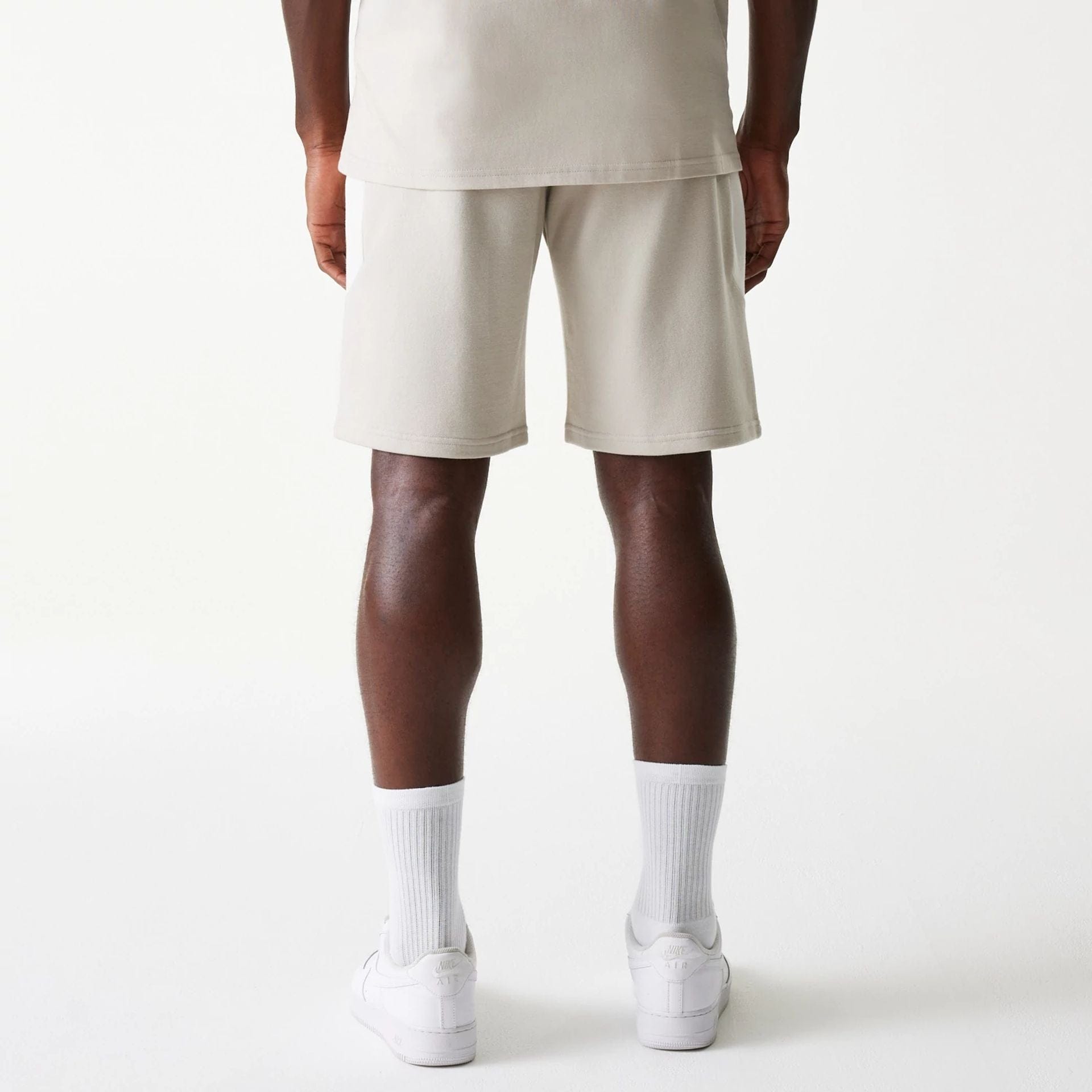 The Male model is wearing New York Yankees MLB Raglan Cream Shorts 2